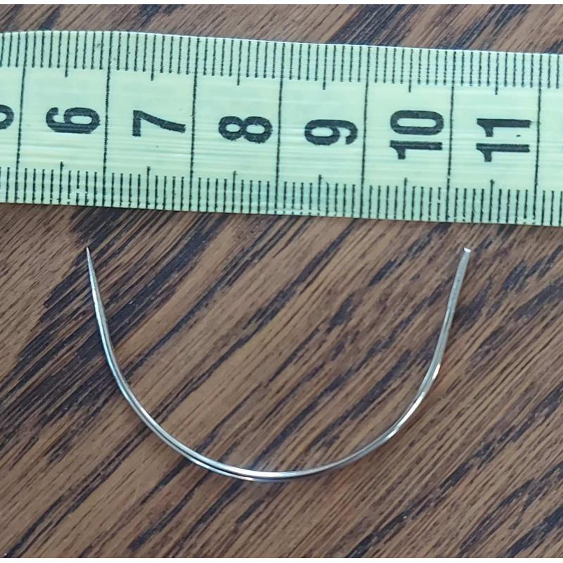 Голка вигнута для шкіри