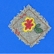 Аплікація для одягу. Цветочек на мешковине.
