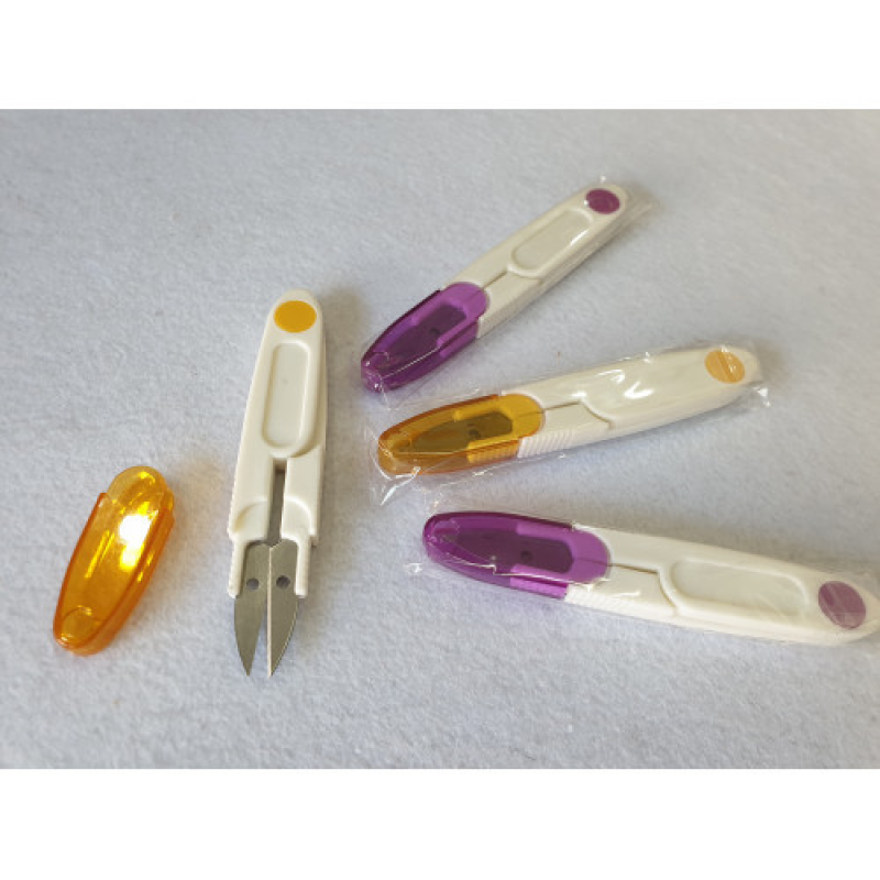 Ножиці для обрізання нитки. Ниткообрізувач