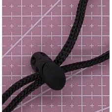 Затискач, фіксатор для шнурка.