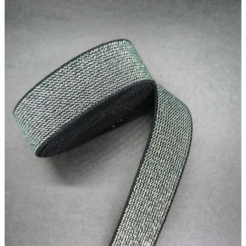 Гумка поясна щільна 25 мм чорно-сібриста Гумка поясна щільна 25 мм чорно-сібриста