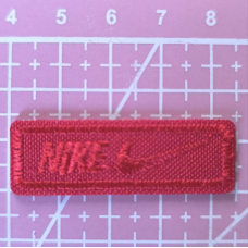 Аплікація для одягу спортивна прямокутна червона. Nike.