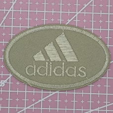 Аплікація для одягу спортивна. Овальна бежева. Adidas.