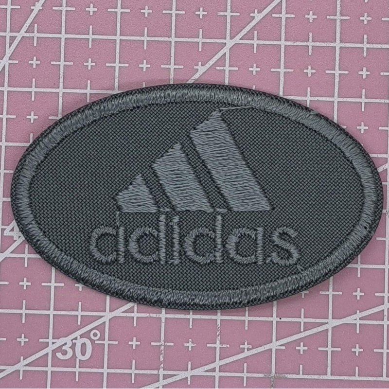 Аплікація для одягу спортивна. Овальна сіра. Adidas.