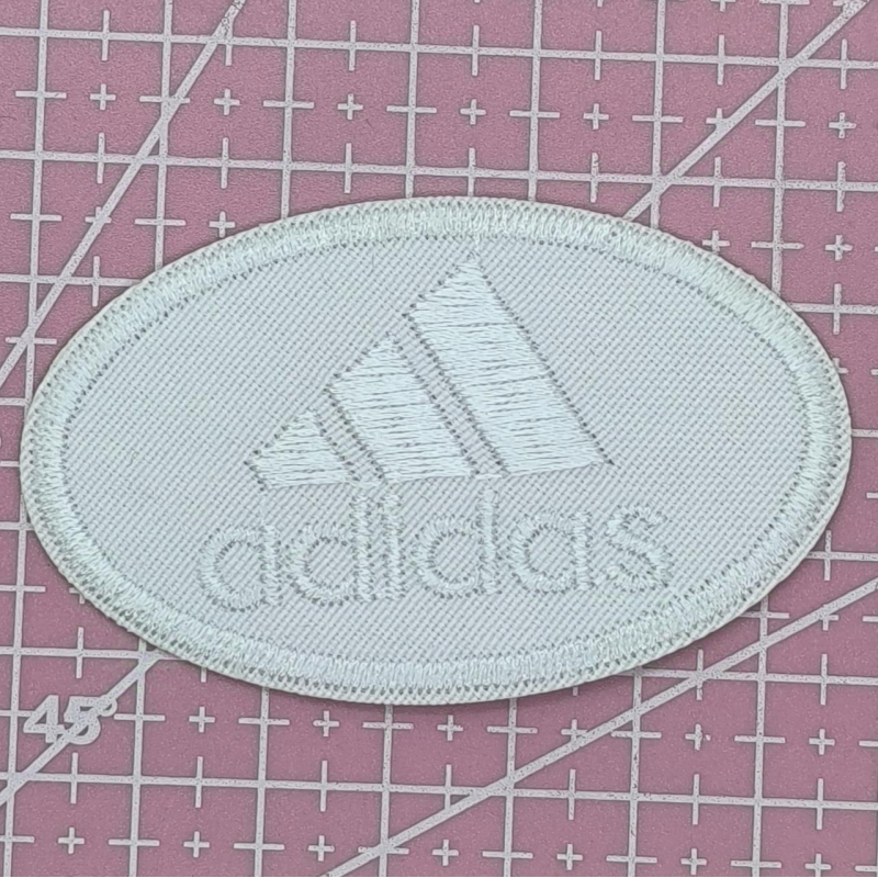 Аплікація для одягу спортивна. Овальна біла. Adidas.