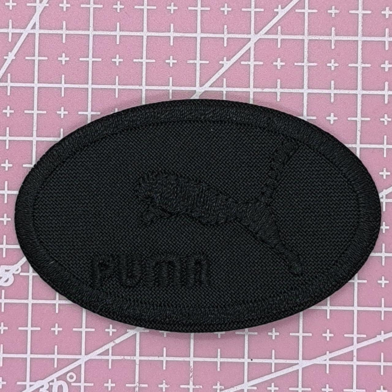 Аплікація для одягу спортивна чорна. Puma. Аплікація для одягу спортивна чорна. Puma.